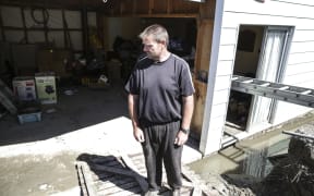 Sewage has flooded properties on Beach Road in Kaikoura, Nigel Sweeny's back yard was inundated with sewage, there is now a temporary landline.