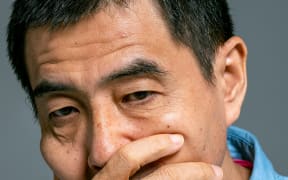 sad asian man