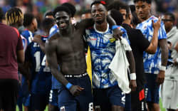 Cape Verde defenders Joao Paulo (L) and Stopira celebrate after their draw against Saudi Arabia in the 2026 World Cup Group H football match in Houston on June 26, 2026. (Photo by RONALDO SCHEMIDT / AFP)