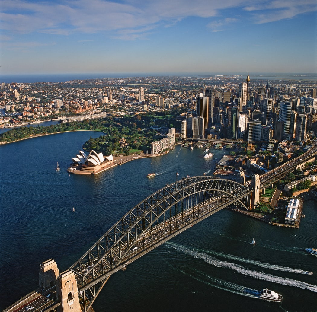 Australia, Sydney, Aerial view of city and bay (Photo by Paul Campbell / Image Source / Image Source via AFP)