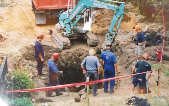 An old photo Daveena Dawrant has collected shows her garden dug up and remediation works, where an abandoned well was discovered.