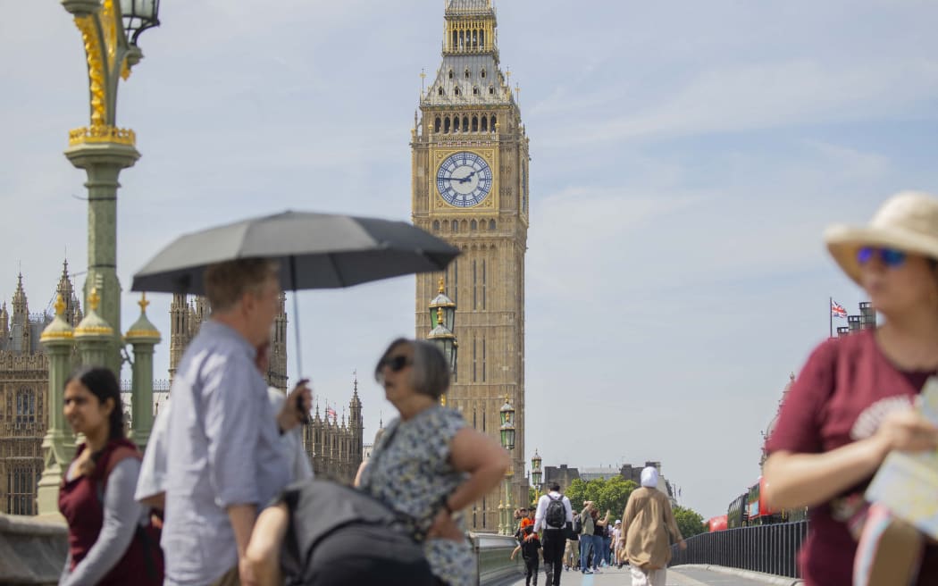 LONDON, UNITED KINGDOM - JUNE 16: A general view of the city where people are set for a scorching end to the week as temperatures are expected to reach highs of 35 degrees in London, United Kingdom on June 16, 2022. It has been reported that the southeast and east of the country, including the capital London, are under a heatwave. While the air temperature that has scorched the country since Wednesday is expected to reach 35 degrees tomorrow, the hot weather will lose its effect with rain on Sunday. Rasid Necati Aslim / Anadolu Agency (Photo by Rasid Necati Aslim / ANADOLU AGENCY / Anadolu Agency via AFP)