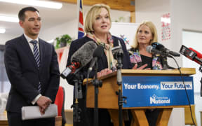 National party leader Judith Collins, flanked by tertiary education spokesperson Simeon Brown and social development spokesperson Louise Upston, announces the SkillStart retraining policy.