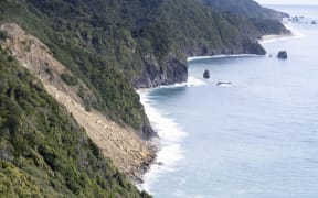 Andrew Dempster/SINGLE USE ONLY
The massive slip just south of Knights Point, looking south towards Haast. State Highway 6 is just out of view at the top of the slip.