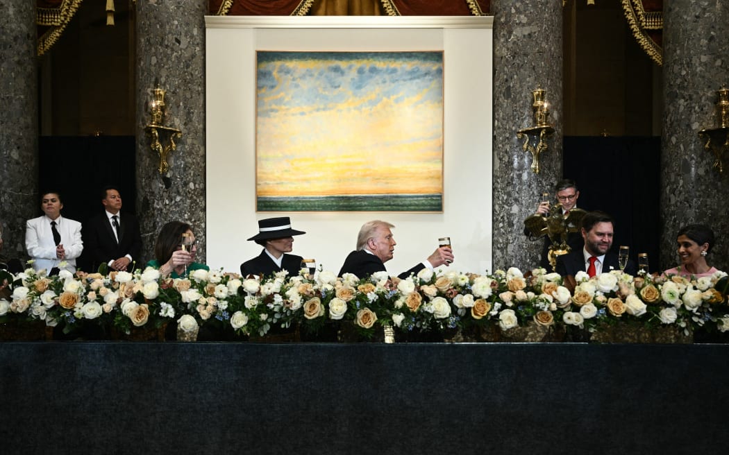 US Speaker of the House Mike Johnson (R) makes a toast during a luncheon in honor of US President Donald Trump following the inauguration ceremony, in Statuary Hall at the US Capitol in Washington, DC, on January 20, 2025. Also pictured, L-R, Kelly Johnson, Senator Deb Fischer, Republican from Nebraska, First Lady Melania Trump, President Donald Trump, Vice President J.D. Vance and Second Lady Usha Vance. (Photo by Brendan SMIALOWSKI / AFP)