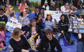 Supporters welcoming New Zealand's Paralympians home.