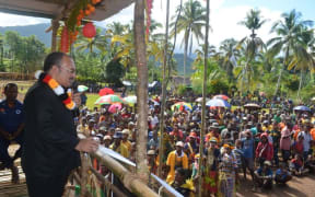 Papua New Guinea Prime Minister Peter O'Neill opens roads and classrooms in Middle Ramu.