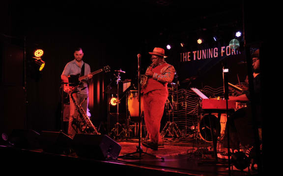 Saxophonist Thabani Gapara on stage.