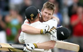 Jimmy Neesham hugs Blackcaps Captain, Brendon McCullum after scoring his maiden test century during the 2nd cricket test between the Black Caps & India in Wellington in February.