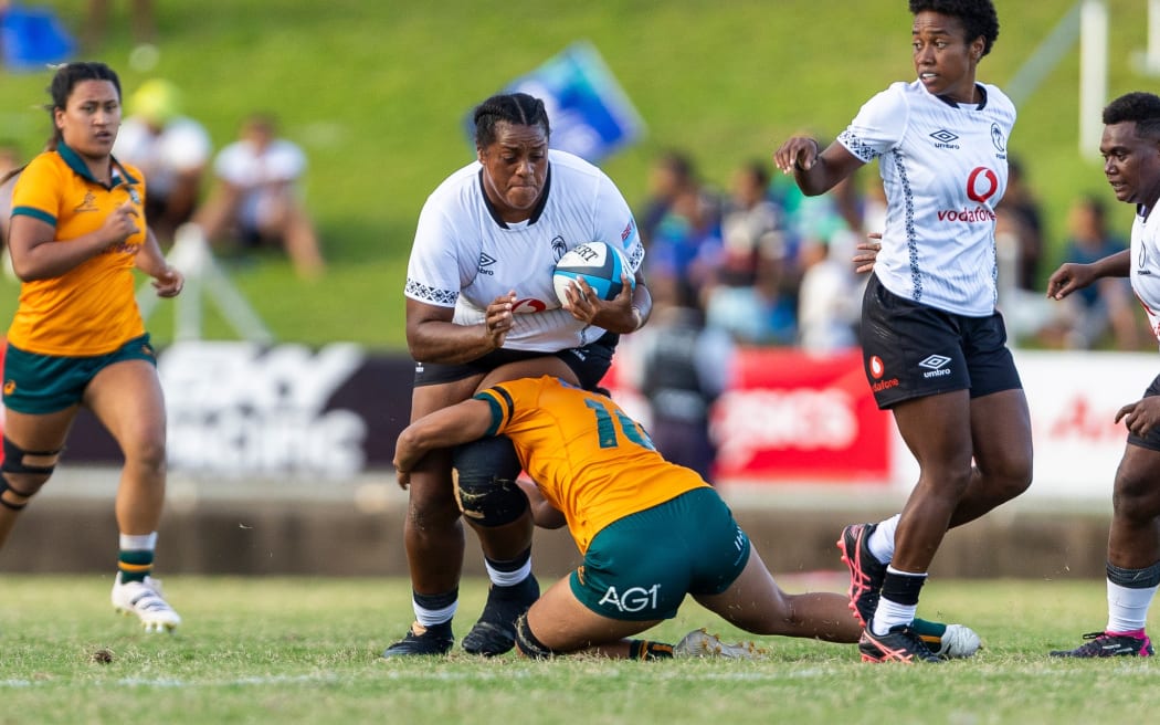 Fijiana prop Ana Korovata battles on against the Wallaroos at the National Stadium, in the team's Test match on Saturday.