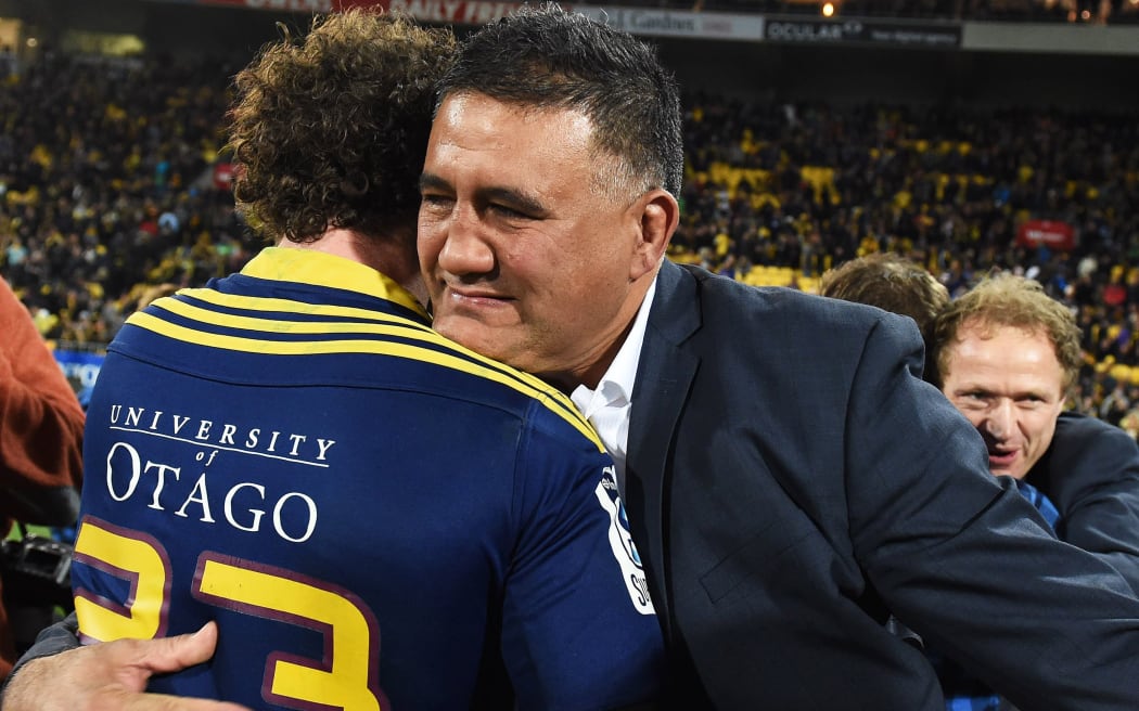 Jamie Joseph embraces Marty Banks after winning the Super Rugby title.
