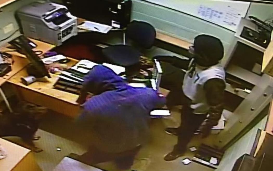 CCTV footage of the robbery at Golden Mile Tavern.