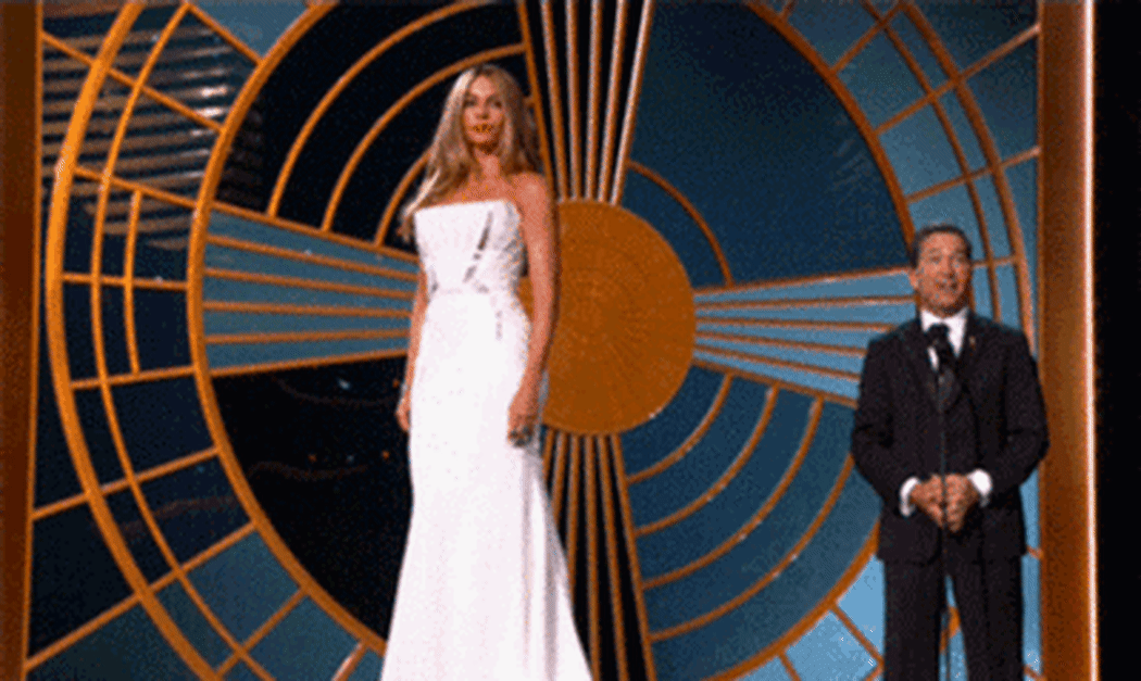 Sophia vergara stands on stage on a rotating pedestal