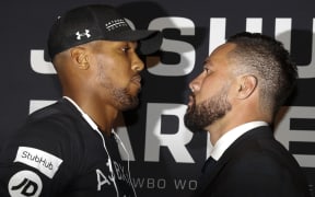 Anthony Joshua (L) and Joseph Parker will go head-to-head in their heavyweight boxing world title showdown in Cardiff this weekend.