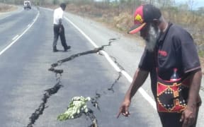 Road cracks near Mutzing along the Markam Valley highway following the 7.6 earthquake