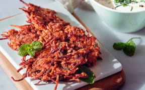 Beetroot and Carrot Fritters with mint lime and yoghurt dressing