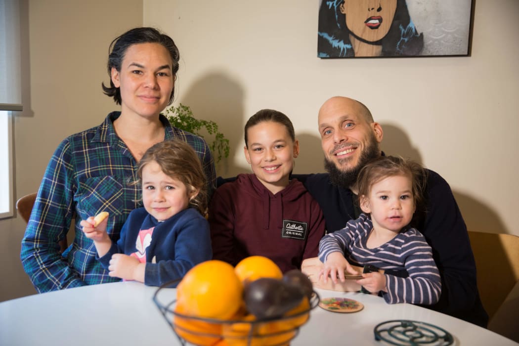 family at kitchen table