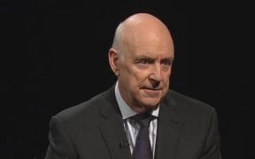 John Clarke as online news director 'Xavier Breth'