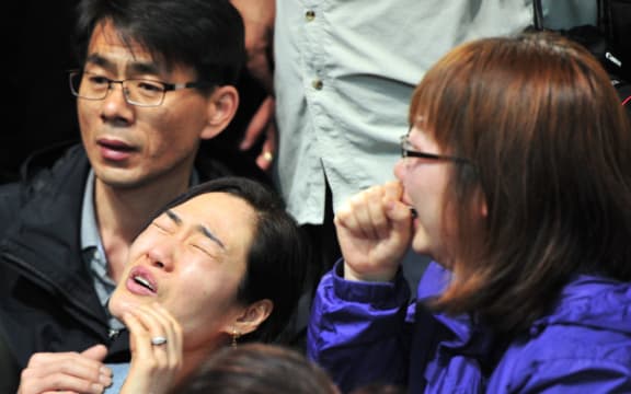 Distraught relatives of ferry passengers have maintained an agonising vigil on shore waiting for any news.