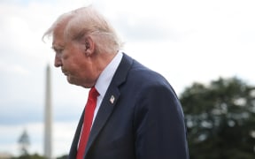 WASHINGTON, DC - SEPTEMBER 11: U.S. President Donald Trump takes questions from members of the press on slain conservative activist Charlie Kirk while departing the White House on September 11, 2025 in Washington, DC. Trump is scheduled to travel to New York City this evening.   Win McNamee/Getty Images/AFP (Photo by WIN MCNAMEE / GETTY IMAGES NORTH AMERICA / Getty Images via AFP)