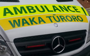 An ambulance with signage in Te Reo Māori.