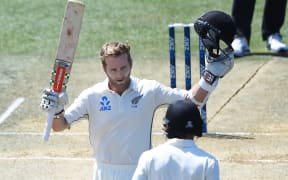 Kane Williamson celebrates his 13th test century.