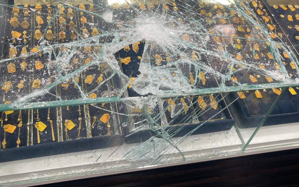The group forced their way inside the store on Great South Road, smashing glass cabinets and stealing jewellery.