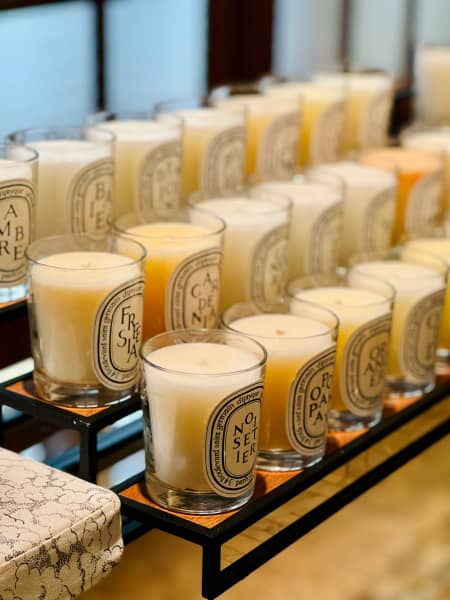A row of candles at 34 Boulevard, St. Germain candles at Diptyque in Paris, France.