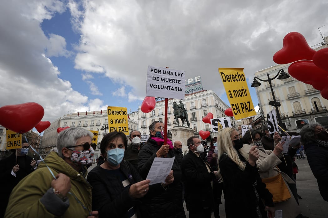 : A group of people gather to support the law drafted at the initiative of the left coalition government and legalised the euthanasia in Madrid, Spain on March 18, 2021.