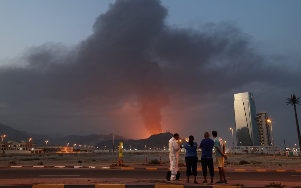 Black smoke ascends following an explosion in the Fujairah industrial zone.