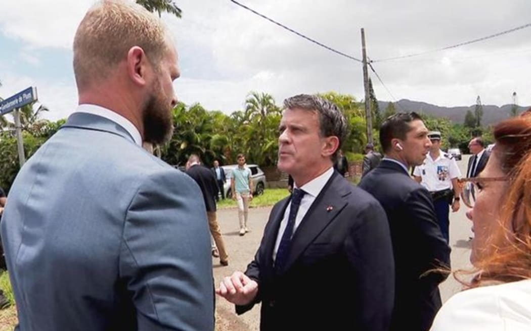French minister for Overseas Manuel Valls meets pro-France supporters as he arrives in New Caledonia on 22 February 2025 as French High Commissioner Louis Le Franc looks on – PHOTO RRB