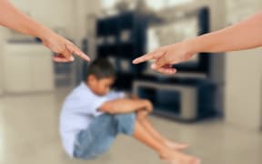 angry parents with boy