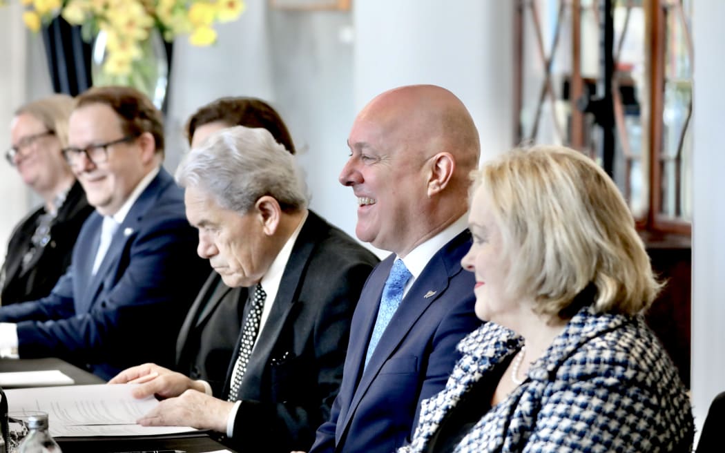 Christopher Luxon, Winston Peters & Judith Collins at a ceremony with Lawrence Wong, Singaporean Prime Minister in Auckland.