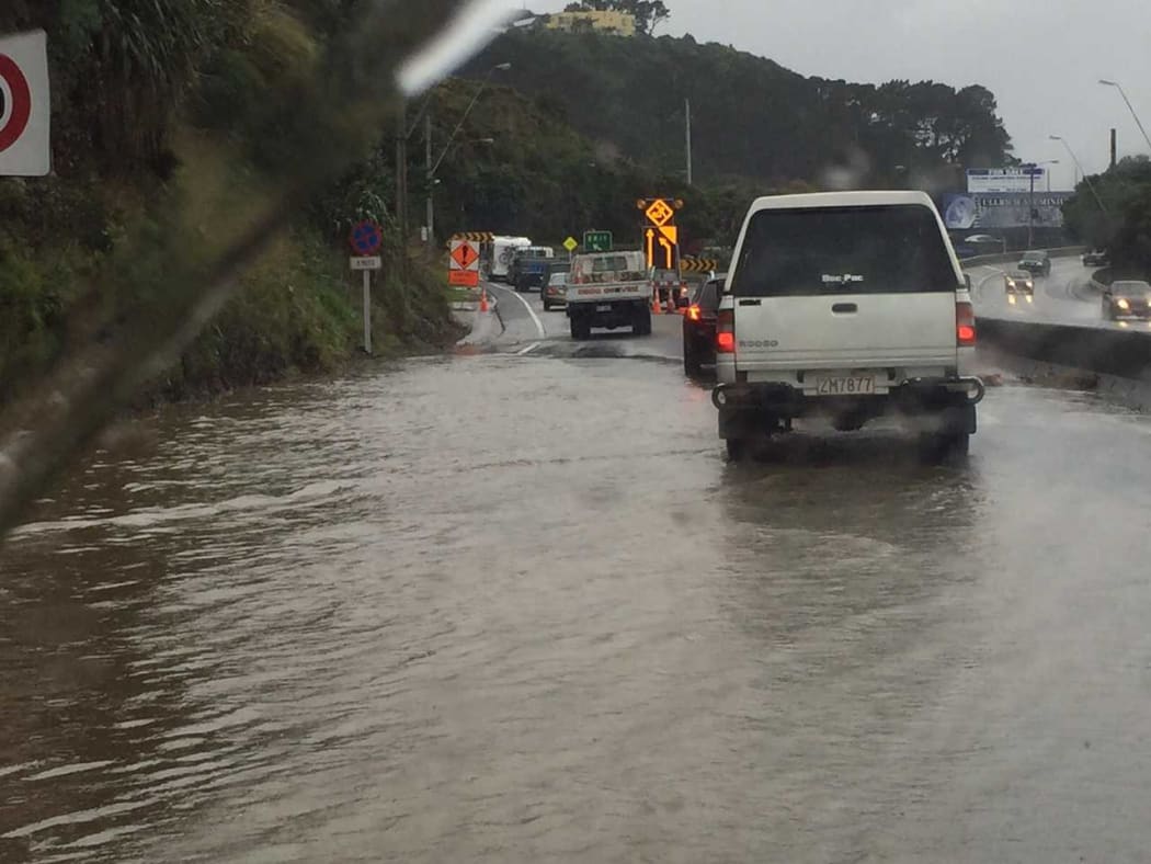 Commuters try to make their way out of the capital.