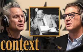 Guyon Espiner is wearing headphones positioned on the left of the image looking to the right. Corin Dann is wearing headphones on the right of the image looking towards the left. In the middle of the image is a square featuring a photo of Sir Robert Muldoon.  In the bottom left hand corner is the logo for the podcast series 'Context' in mustard yellow.