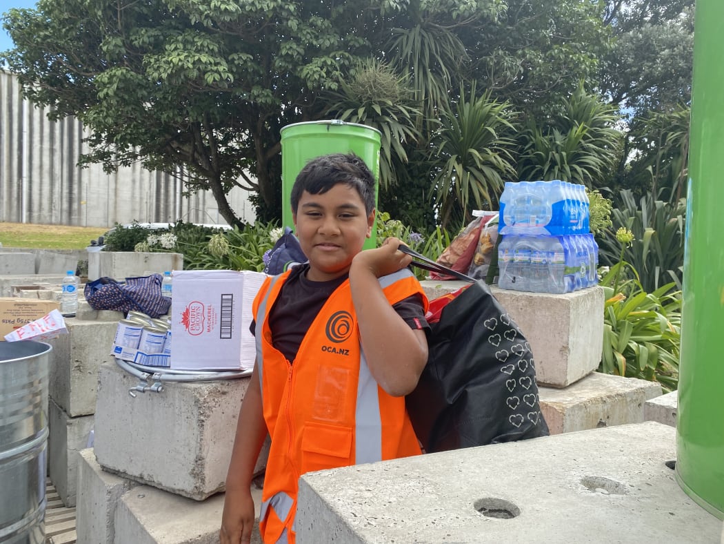 10-year-old Dempsey Taukeiaho helping with donations for the Tonga Tsunami relief effort
