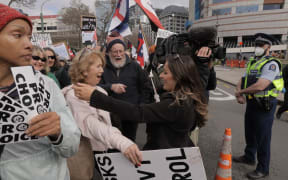 Anti-government protesters in Wellington, marching towards Parliament on 23 August 2022.