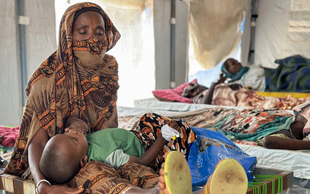 Cholera infected patients receive treatment in the cholera isolation centre at the refugee camps of western Sudan, in Tawila city, Darfur, on 14 August, 2025. At least 40 people have died in Sudan's Darfur region in the country's worst cholera outbreak in years, Doctors Without Borders (MSF) said on 14 August.