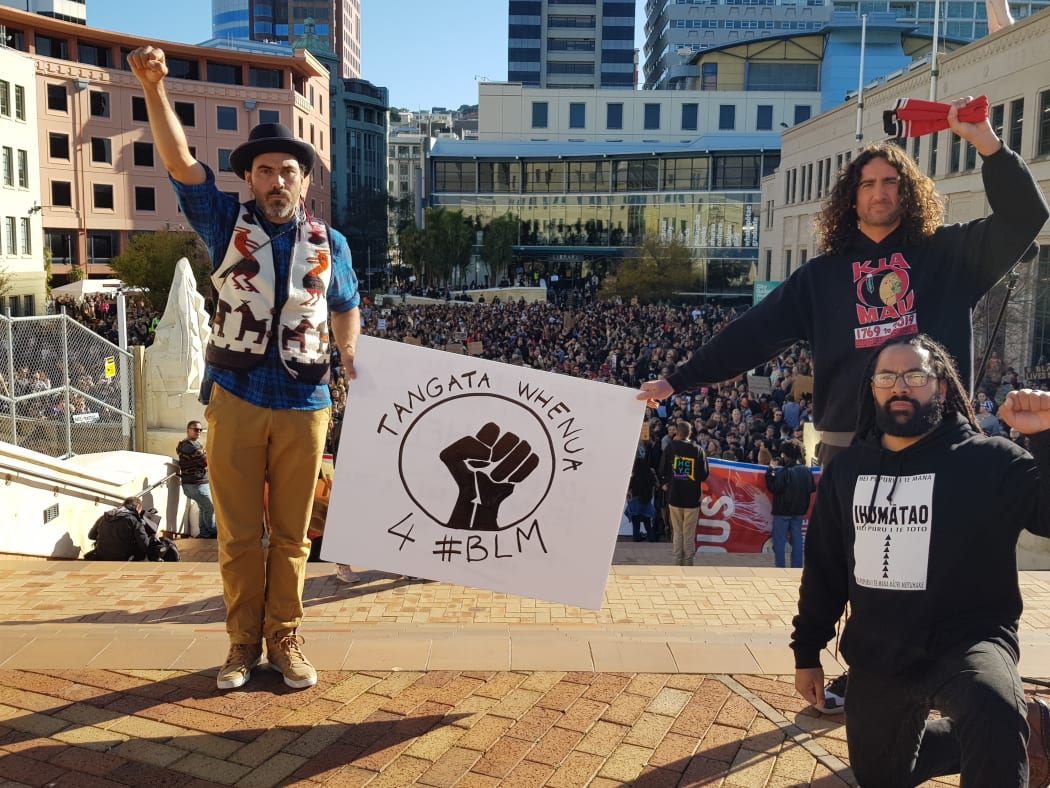 From left, Raihania Tipoki, Tawhana Chadwick, Matt Renata prepare to take part in the march in Wellington on 14 June, 2020.