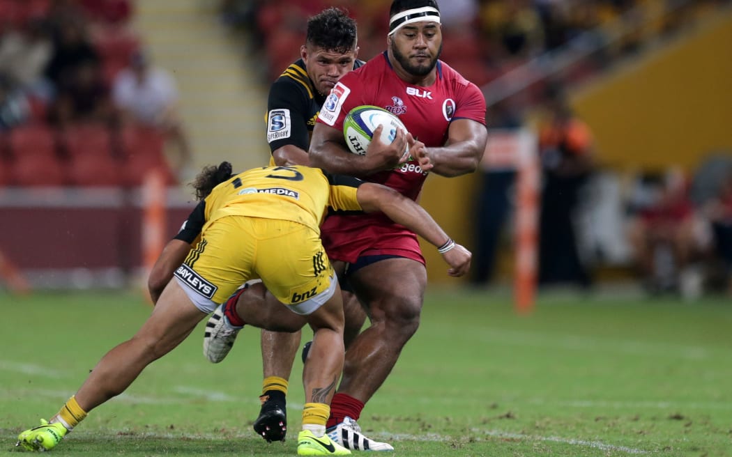 Taniela Tupou on the charge against the Hurricanes.