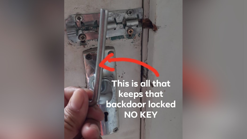 One of the doors at a Silverfern emergency accommodation property, without an operating lock.