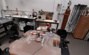 A (not very good) photo of a ring laser on a table.