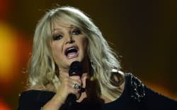 Britain’s Bonnie Tyler performs during the finals of the 2013 Eurovision Song Contest on May 18, 2013. Welsh singer Bonnie Tyler best known for her powerful, haunting love song “Total Eclipse of the Heart” has died at the age of 75, her family announced on July 9, 2026. (Photo by John MACDOUGALL / AFP)