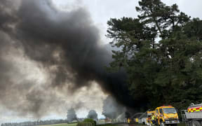 Fire fighters were called to the blaze burning through trees at a property near Darfield about 10am.