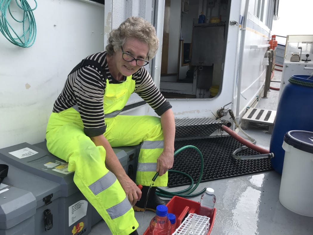 Dr. Kim Currie gets ready to collect another water sample.