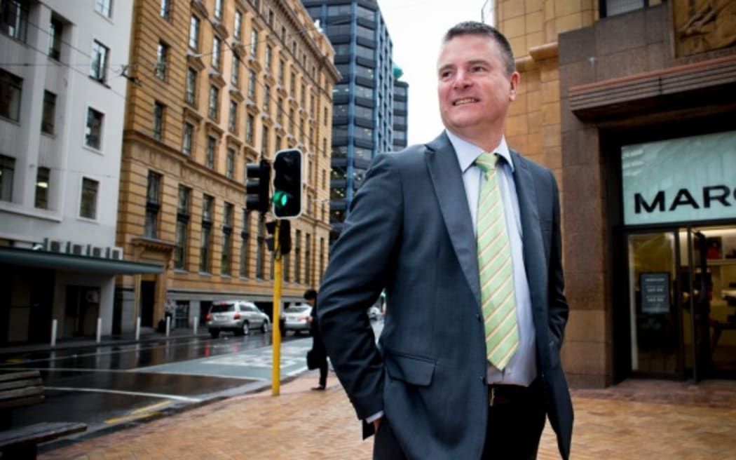 Mark Wilkinson stands in Wellington's main shopping thoroughfare.