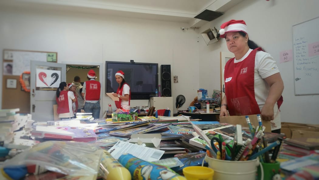 Volunteers sort presents at Auckland City Mission