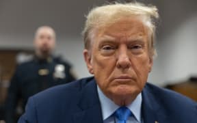 Former US President Donald Trump attends his trial for allegedly covering up hush money payments linked to extramarital affairs, at Manhattan Criminal Court in New York City on April 26, 2024. Trump's defense team vied to probe holes in tabloid publisher David Pecker's testimony during the trial on April 25, after jurors heard days of testimony regarding a plot to kill salacious stories that could have thwarted the Republican's 2016 White House bid. (Photo by JEENAH MOON / POOL / AFP)