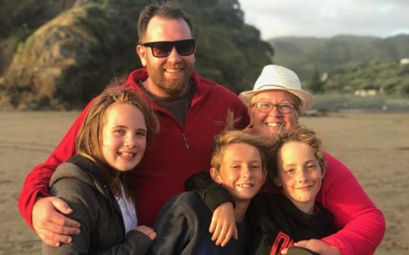 Young bus crash victim Hannah Francis with her family - her dad Matthew, step-mum Christina and step-brothers Joshua (left) and Caleb (right).