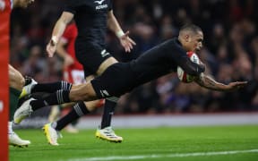 Aaron Smith scores his first try against Wales in Cardiff.